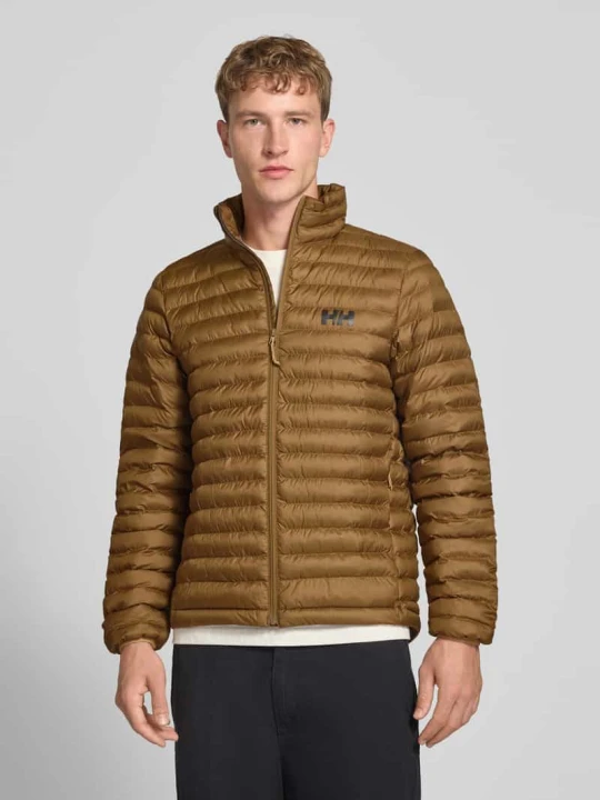 Zdjęcie produktu Kurtka pikowana z nadrukiem z logo Helly Hansen Musztardowy