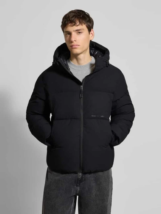 Zdjęcie produktu Kurtka puchowa z kapturem o kroju regular fit model 'Jorve' Jack&Jones Czarny