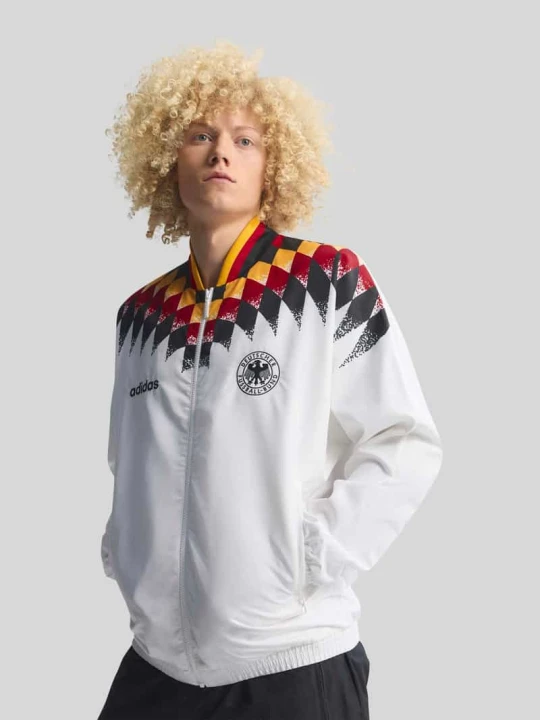 Zdjęcie produktu kurtka treningowa o kroju regular fit z detalem dfb z logo Adidas Biały