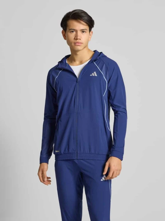 Zdjęcie produktu Kurtka treningowa o kroju regular fit z nadrukiem z logo model ‘Tech’ Adidas Ciemnoniebieski