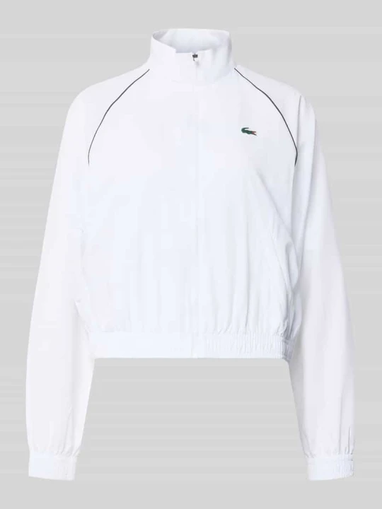 Zdjęcie produktu Kurtka treningowa o kroju relaxed fit z naszywką z logo Lacoste Biały