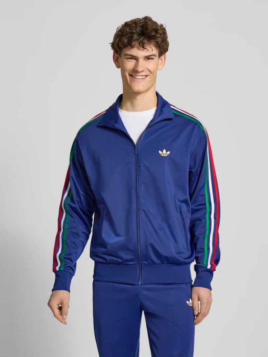 Zdjęcie produktu Kurtka treningowa w kroju regular fit z wielokolorowymi pasami kontrastowymi model 'FIREBIRD TT' adidas Originals Ciemnoniebieski