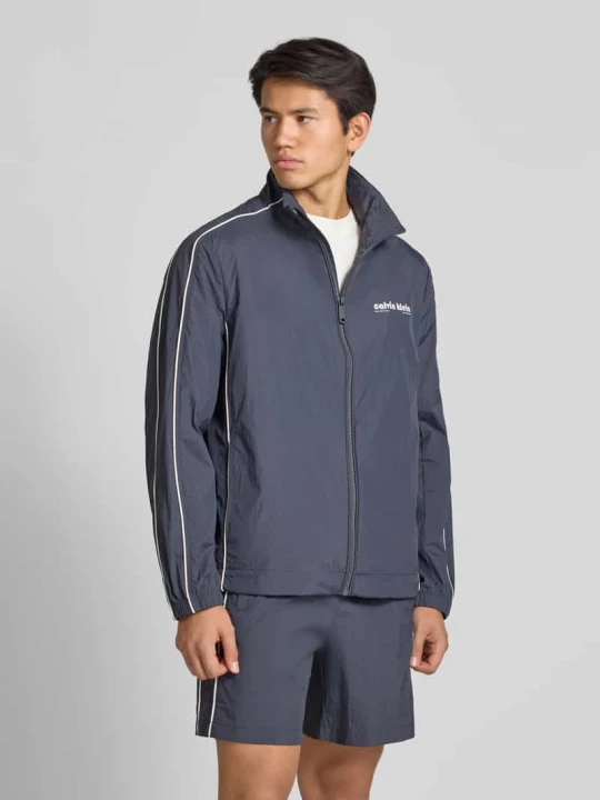 Zdjęcie produktu Kurtka treningowa z nadrukiem z logo Calvin Klein Jeans Ciemnoniebieski