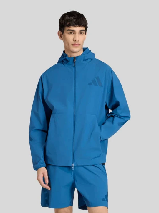 Zdjęcie produktu kurtka treningowa z nadrukiem z logo model 'Z.N.E. WOVEN ORIGINALS' Adidas Niebieski