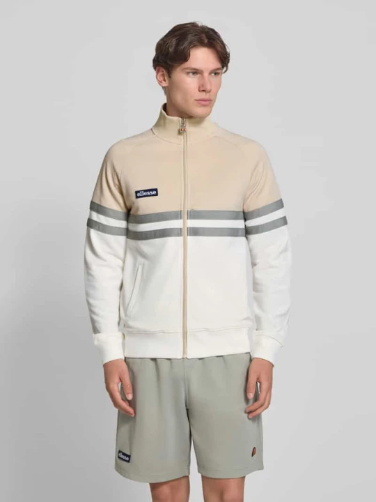 Zdjęcie produktu Kurtka treningowa z naszywką z logo i stójką model 'RIMINI' Ellesse Złamany biały