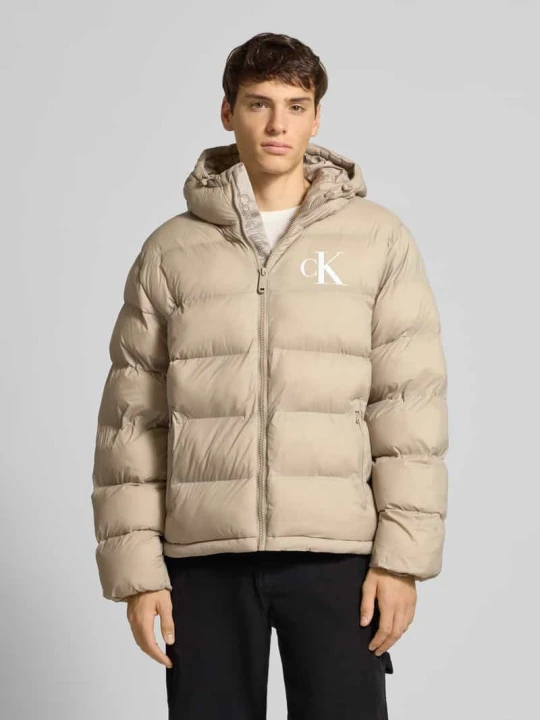 Zdjęcie produktu Kurtka w stylu puffer o kroju regular fit z nadrukiem z logo model 'Monogram' Calvin Klein Jeans Beżowy