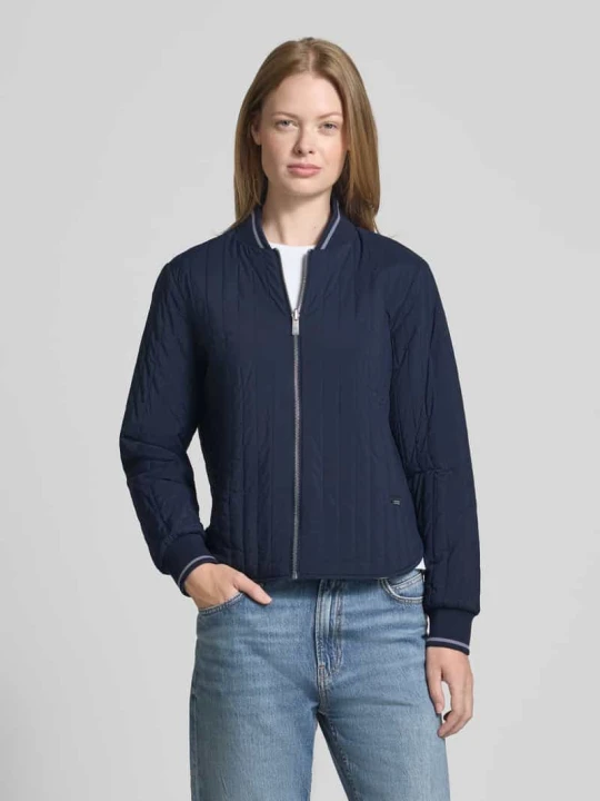 Zdjęcie produktu Kurtka z bocznymi, wpuszczanymi kieszeniami i detalem z logo Scotch & Soda Granatowy