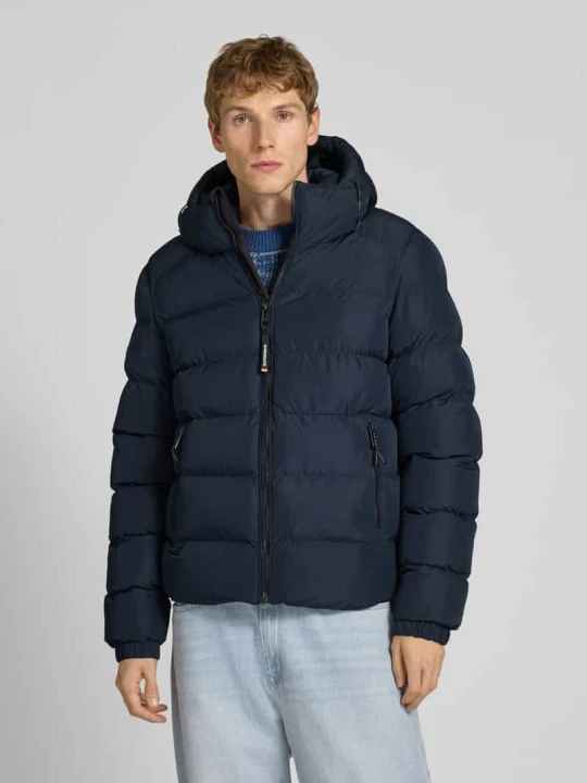 Zdjęcie produktu Kurtka pikowana z kapturem i bocznymi kieszeniami zapinanymi na zamek błyskawiczny Superdry Granatowy