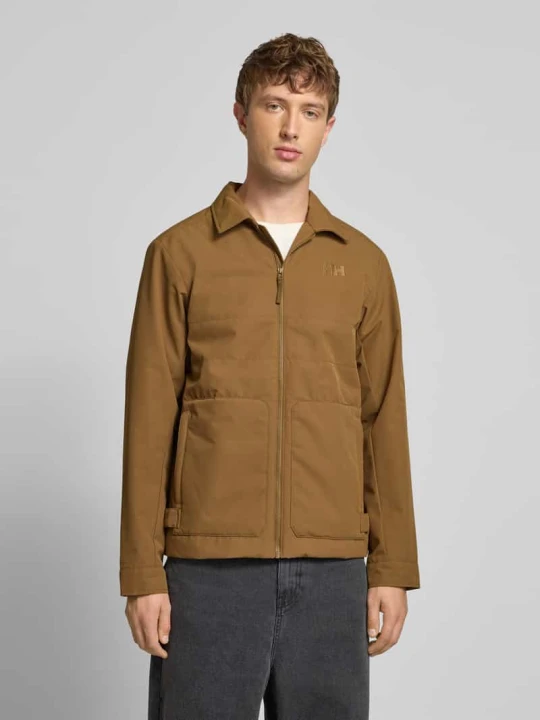 Zdjęcie produktu Kurtka z logo i wpuszczanymi kieszeniami model ‘ESCAPE INS’ Helly Hansen Camel