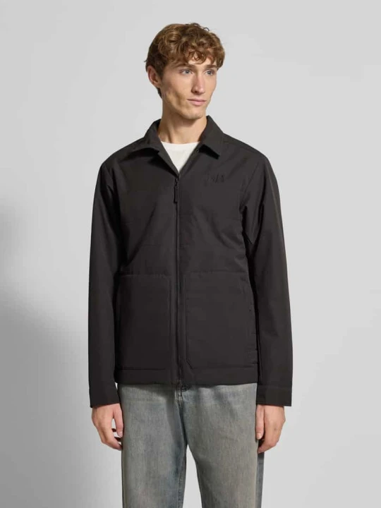 Zdjęcie produktu Kurtka z logo i wpuszczanymi kieszeniami model ‘ESCAPE INS’ Helly Hansen Czarny