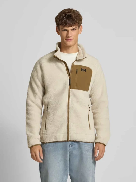Zdjęcie produktu Kurtka z polaru z wyhaftowanym logo i kieszenią na piersi Helly Hansen Złamany biały melanż