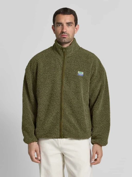 Zdjęcie produktu Kurtka z polaru ze stójką i detal z logo model 'HOKTOWN' American Vintage Oliwkowy