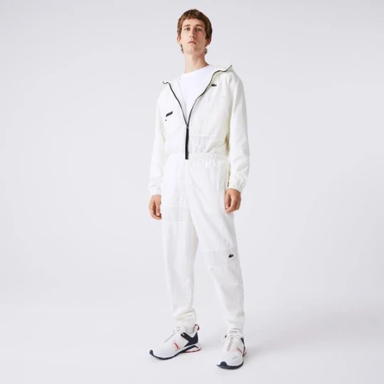 Zdjęcie produktu Męskie Wodoodporne Spodnie Sportowe Z Efektem Patchworku Lacoste