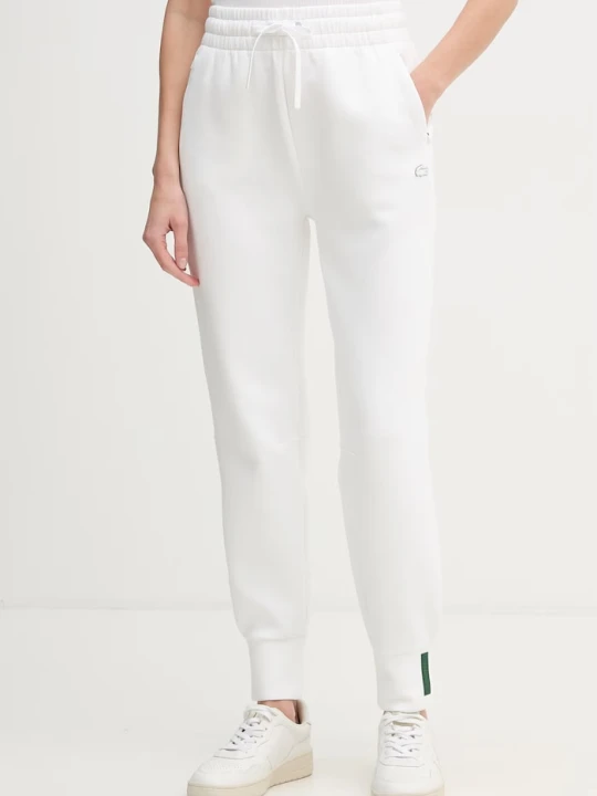 Zdjęcie produktu Lacoste spodnie dresowe damskie z bawełną beżowy