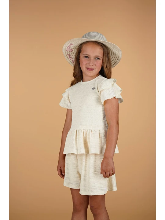 Zdjęcie produktu Le Chic Koszulka "Neline" w kolorze kremowym rozmiar: 116