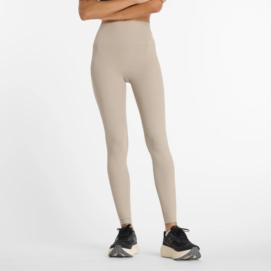 Zdjęcie produktu Legginsy damskie New Balance WP53152ADS – beżowe