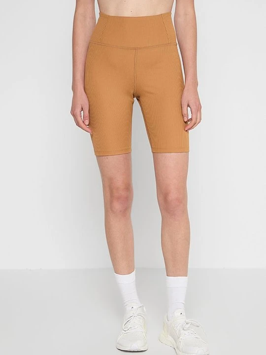 Zdjęcie produktu Legginsy Girlfriend Collective ochra