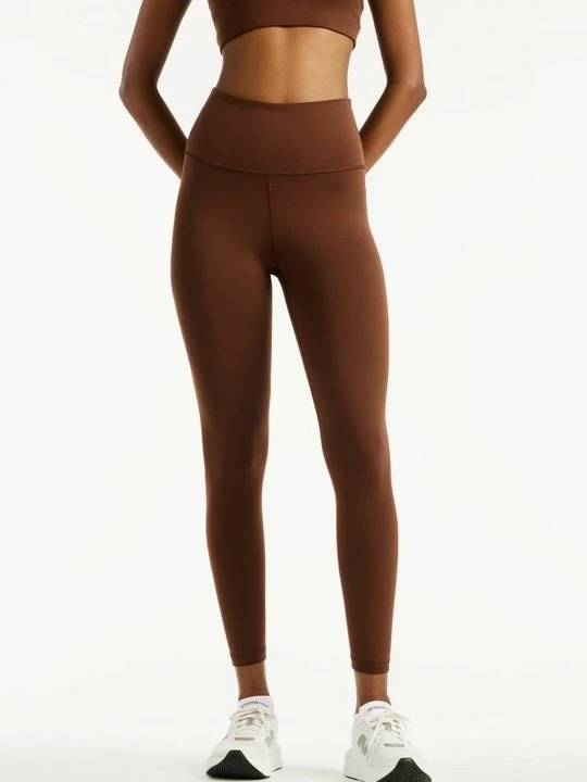 Zdjęcie produktu Legginsy New Balance ciemnobrązowy