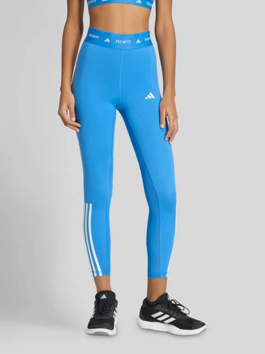 Zdjęcie produktu Legginsy o kroju slim fit z detalami z logo Adidas Niebieski