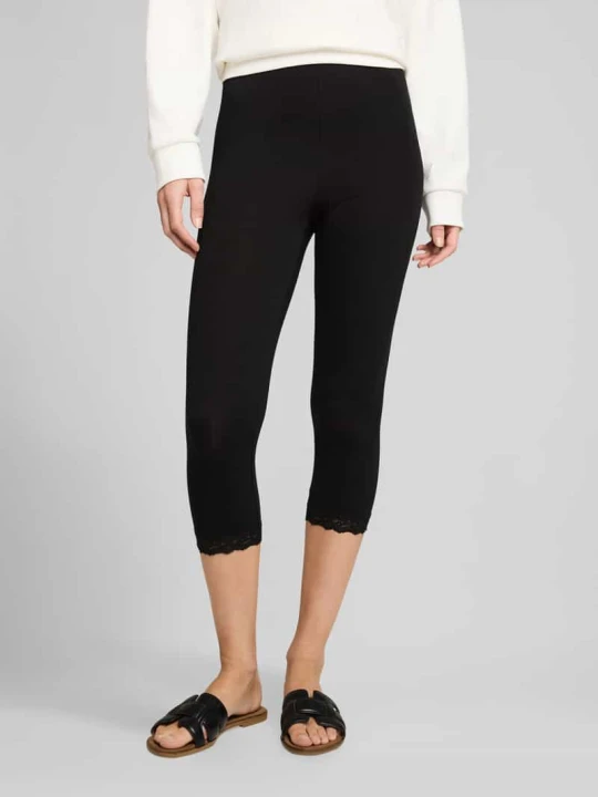 Zdjęcie produktu legginsy o kroju slim fit z mieszanki bawełny z obszyciem koronką Tom Tailor Czarny