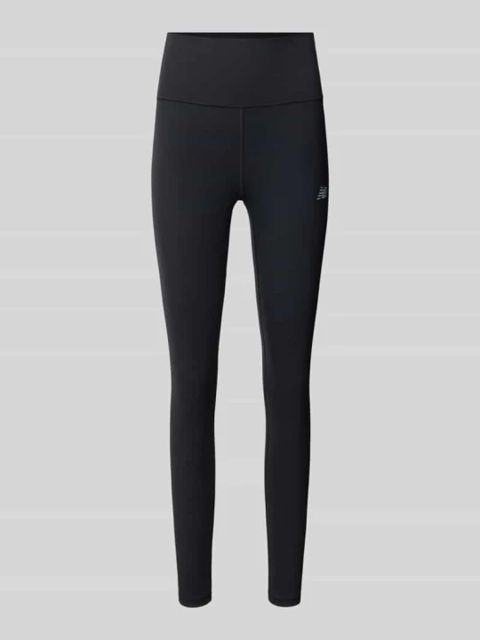 Zdjęcie produktu legginsy o kroju slim fit z nadrukiem z logo model 'Harmony' New Balance Czarny