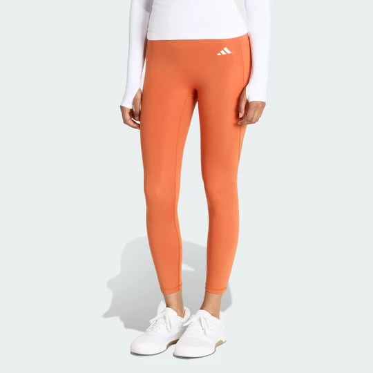 Zdjęcie produktu Legginsy Optimé Essentials No Front Rise Seam 7 / 8 Adidas Fox Orange