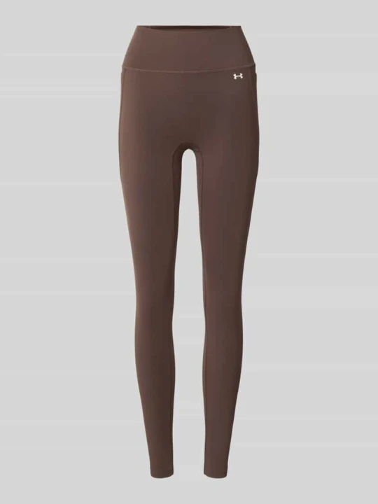 Zdjęcie produktu legginsy sportowe o kroju slim fit z nadrukiem z logo Under Armour Ciemnobrązowy