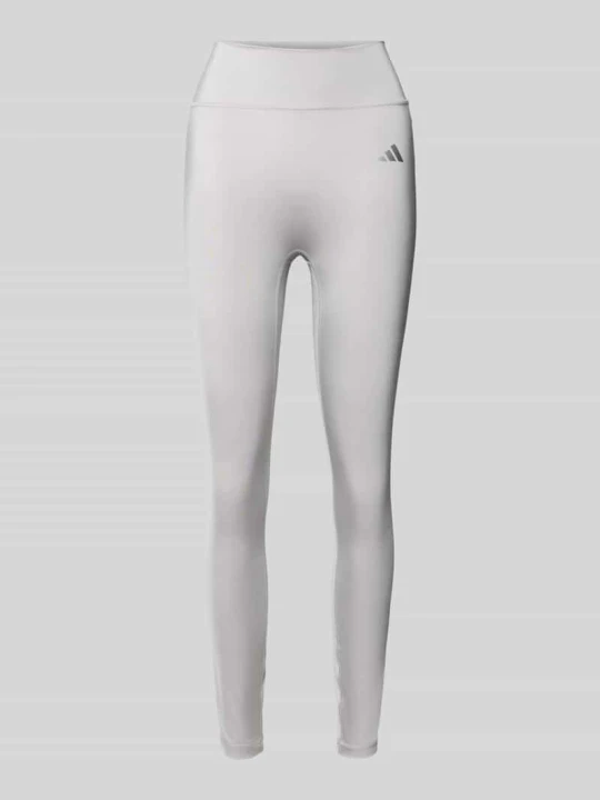 Zdjęcie produktu Legginsy sportowe z nadrukiem z logo Adidas Srebrny