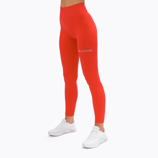 Zdjęcie produktu Legginsy treningowe damskie Gym Glamour Push Up coral Pomarańczowy