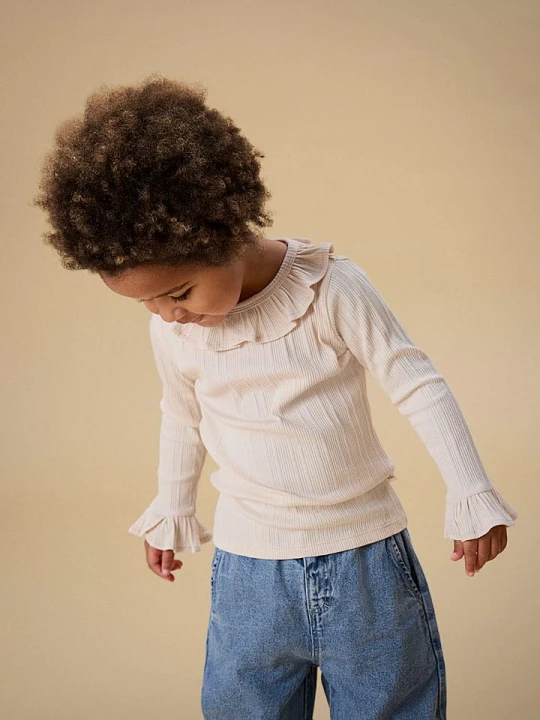 Zdjęcie produktu Lil Atelier Koszulka "Tansy" w kolorze beżowym rozmiar: 104 Lil' Atelier