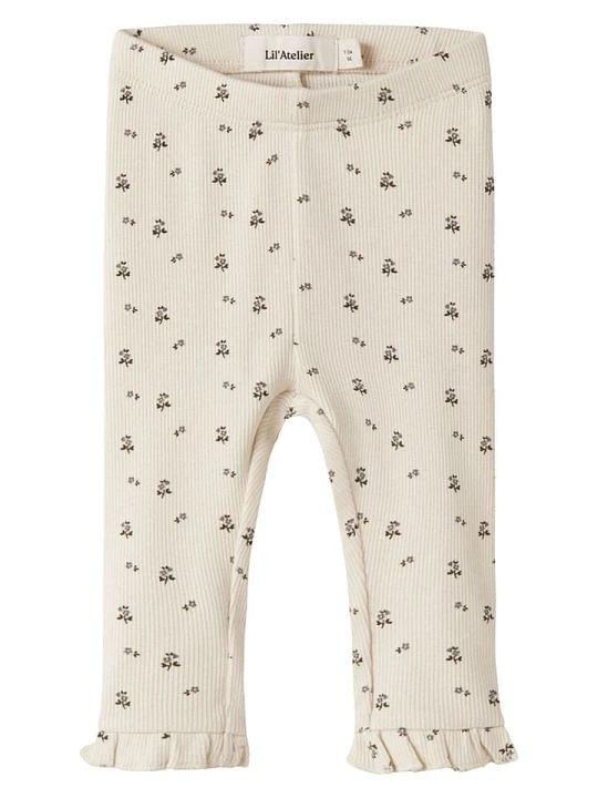 Zdjęcie produktu Lil Atelier Legginsy "Lago" w kolorze kremowym rozmiar: 86 Lil' Atelier