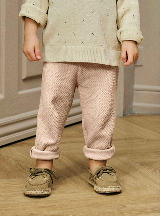 Zdjęcie produktu Lil Atelier Spodnie dresowe "Noella" w kolorze jasnoróżowym rozmiar: 98 Lil' Atelier