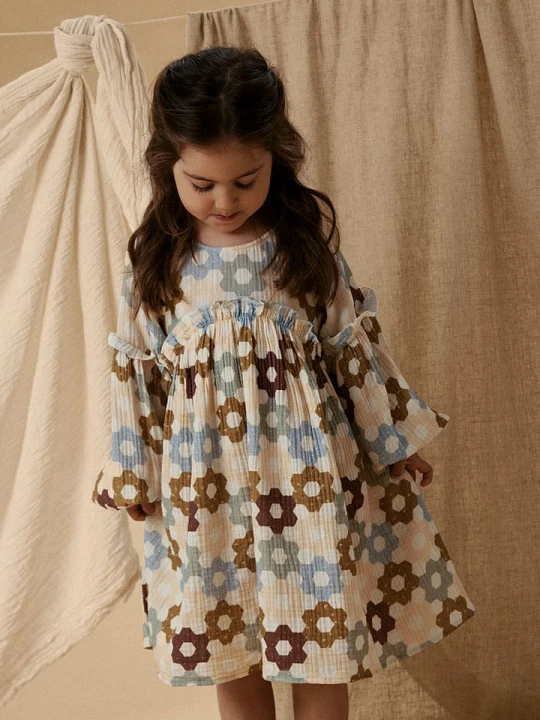 Zdjęcie produktu Lil Atelier Sukienka "Talia" w kolorze beżowym ze wzorem rozmiar: 92 Lil' Atelier