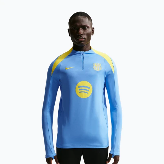 Zdjęcie produktu Longsleeve piłkarski męski Nike FC Barcelona Strike Fourth Knit Drill Top university blue / opti yellow