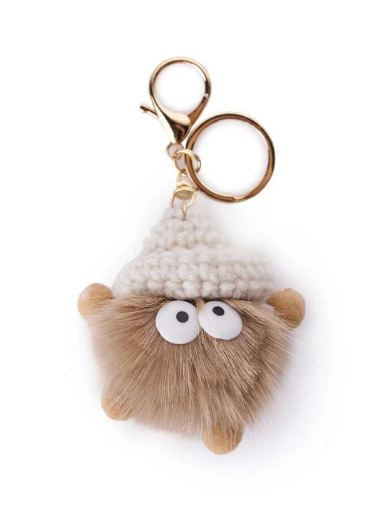 Zdjęcie produktu Lucky Bees Zawieszka "Ponpon" w kolorze beżowym do torebki / kluczy - dł. 13 cm rozmiar: onesize