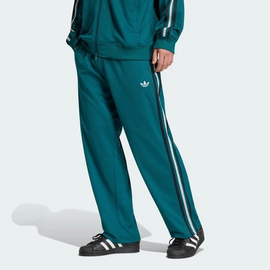 Zdjęcie produktu LUŹNE, SIATECZKOWE SPODNIE DRESOWE ADICOLOR SST Adidas Rich Green