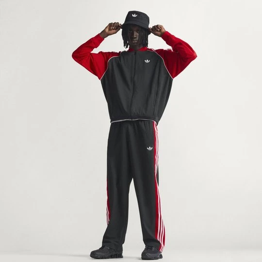 Zdjęcie produktu LUŹNE SPODNIE DRESOWE Z SIATECZKI Adidas czarny
