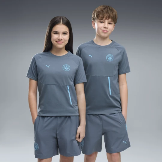 Zdjęcie produktu MÅ‚odzieÅ¼owa koszulka Manchester City PUMATECH z kieszeniÄ…, OdzieÅ¼, Szary