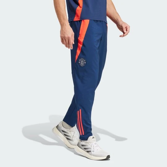 Zdjęcie produktu Manchester United Tiro 24 Presentation Tracksuit Bottoms Adidas niebieski