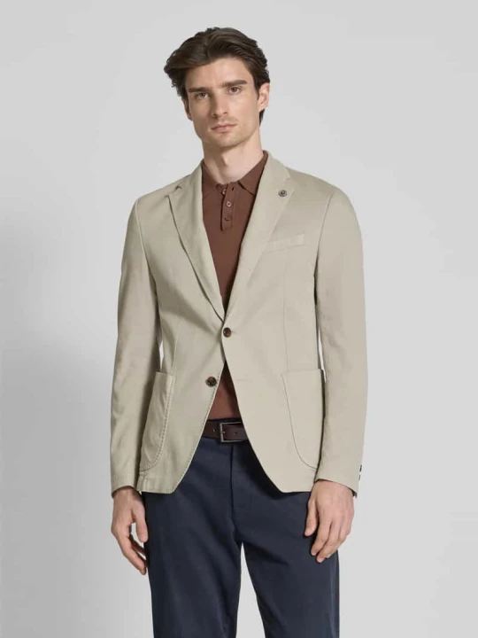 Zdjęcie produktu Marynarka na 2 guziki męska JOOP! Collection;Mieszanka bawełny z dodatkiem lyocellu;Krój slim fit;Model ‘Hoverest’;Kołnierz z połami;Wpuszczane kieszenie;Długoś Beżowy