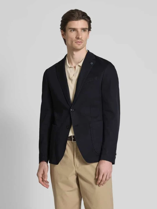 Zdjęcie produktu Marynarka na 2 guziki męska JOOP! Collection; Mieszanka bawełny z dodatkiem lyocellu; Krój slim fit; Model ‘Hoverest’; Kołnierz z połami; Wpuszczane kieszenie; Długoś Granatowy