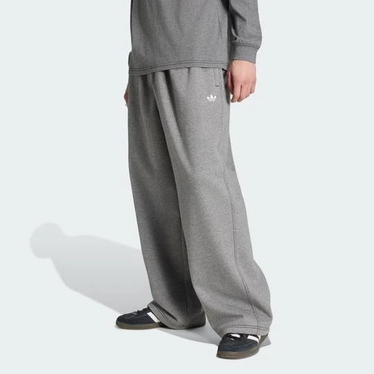 Zdjęcie produktu MELANŻOWE SPODNIE TREFOIL ESSENTIALS TYPU BAGGY BEZ MANKIETÓW Adidas Grey Four Mel