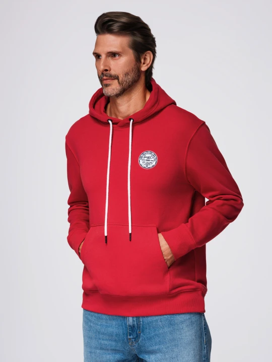 Zdjęcie produktu Męska bluza dresowa kangurka z kapturem i naszywką w stylu college – czerwona V1 - Rozmiar: L Ombre Clothing