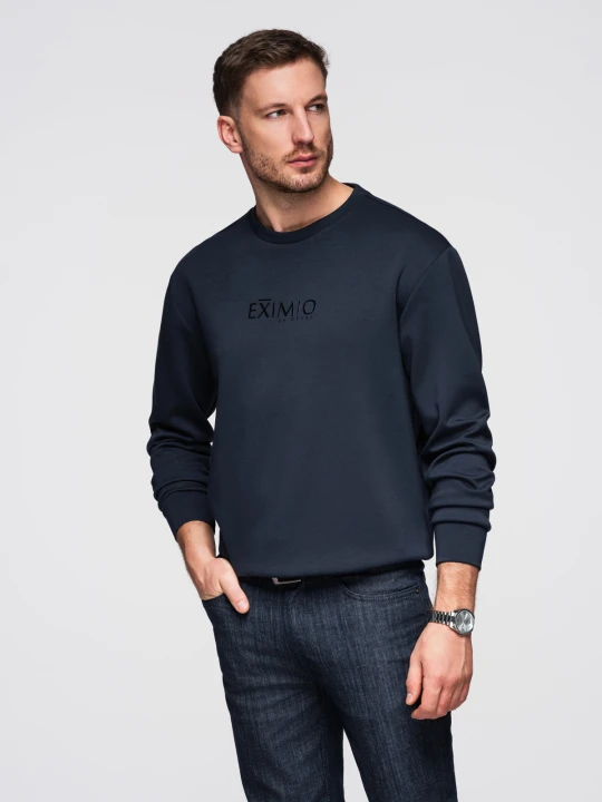 Zdjęcie produktu Męska bluza regular z błyszczącym printem na klatce piersiowej - ciemnoniebieska V4 - Rozmiar: L Ombre Clothing ciemnoniebieski