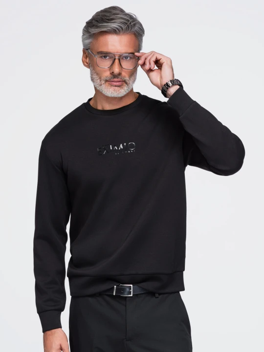 Zdjęcie produktu Męska bluza regular z błyszczącym printem na klatce piersiowej - czarna V1 - Rozmiar: L Ombre Clothing