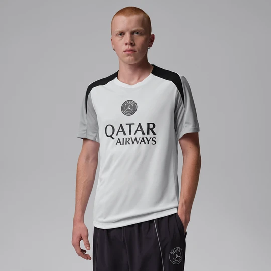 Zdjęcie produktu Męska dzianinowa koszulka piłkarska z krótkim rękawem Jordan Dri-FIT Paris Saint-Germain Strike (edycja nocna) - Biel