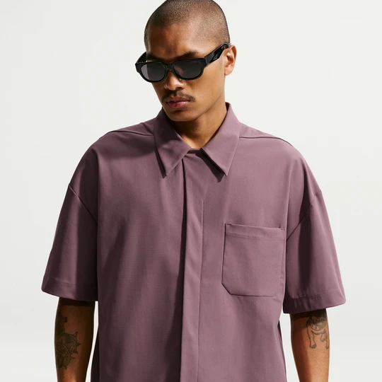 Zdjęcie produktu Męska koszula zapinana na guziki z ochroną przed promieniowaniem UV Dri-FIT Nike 24.7 PerfectStretch - Fiolet