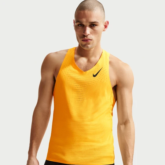 Zdjęcie produktu Męska koszulka bez rękawów do biegania Dri-FIT ADV Nike AeroSwift - Pomarańczowy