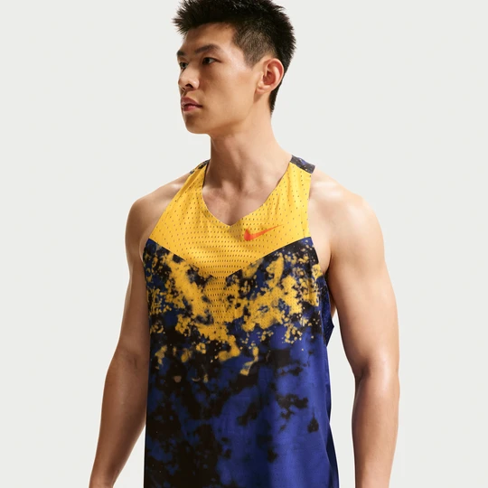 Zdjęcie produktu Męska koszulka bez rękawów do biegania Dri-FIT ADV Nike AeroSwift - Żółty