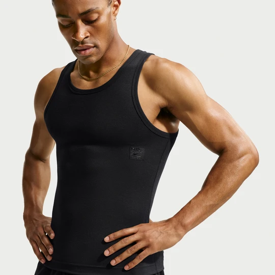 Zdjęcie produktu Męska koszulka bez rękawów Nike z prążkowanego materiału N.A.C. Dri-FIT - Czerń